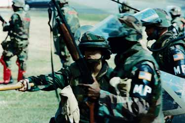 Lt. Cassandra Burns gives directions to one of her platoon members